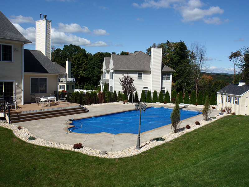 Swimming pool and stamped concrete project example 175